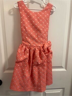 Girls' Coral Sleeveless Party Dress with Side Bow Accent